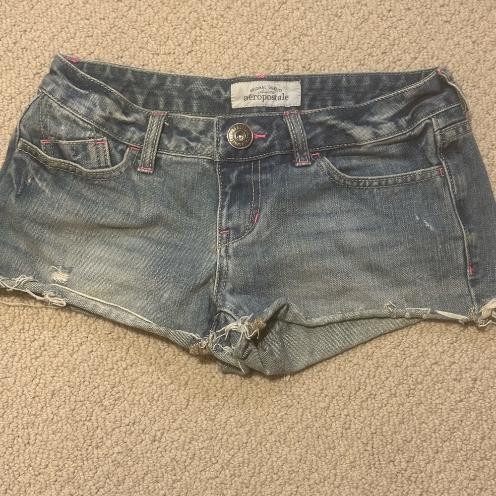 Vintage Blue Jean Shorts with Distressed Hem and Stretch Fit